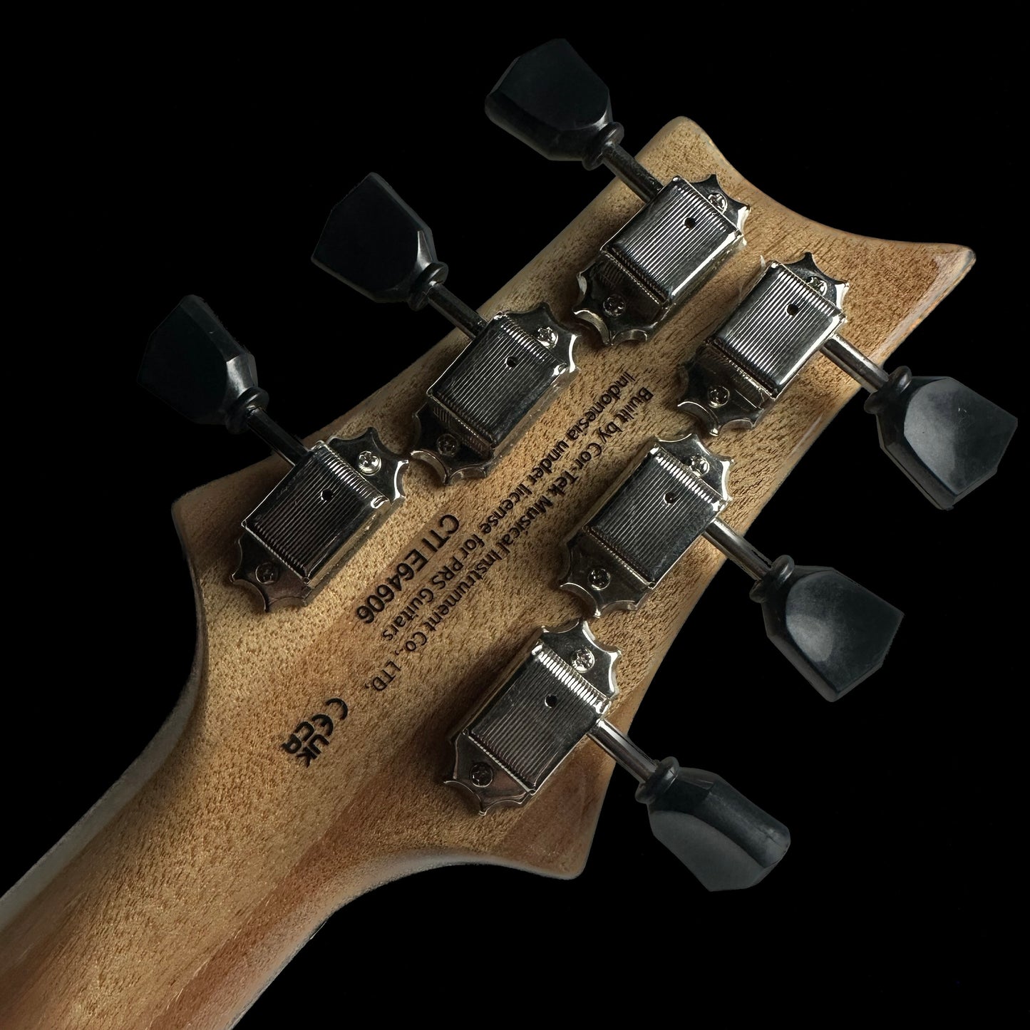 Back of headstock of PRS Paul Reed Smith SE Paul's Guitar Faded Blue Burst.