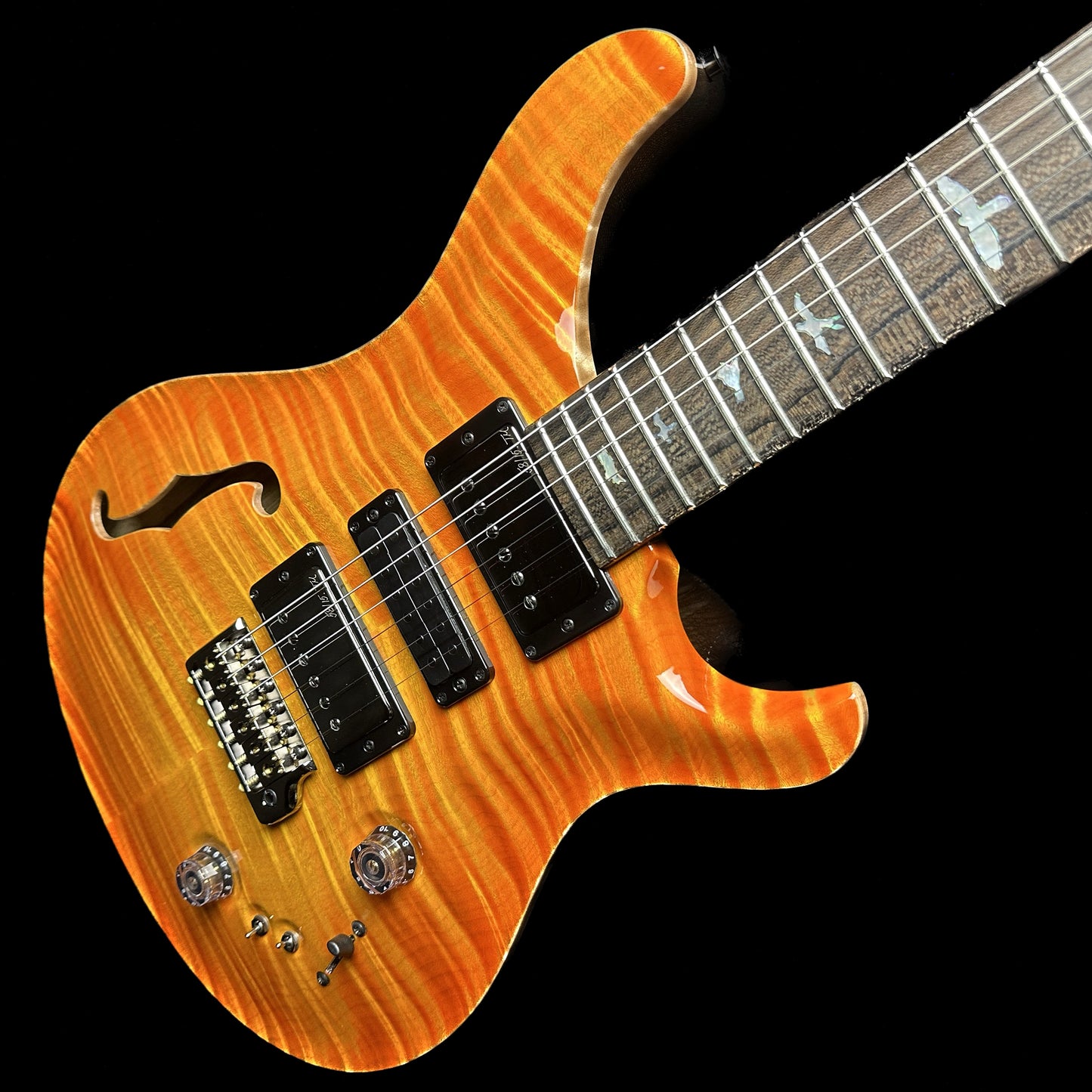Front angle of PRS Private Stock Special Semi-hollow Limited Edition Citrus Glow.