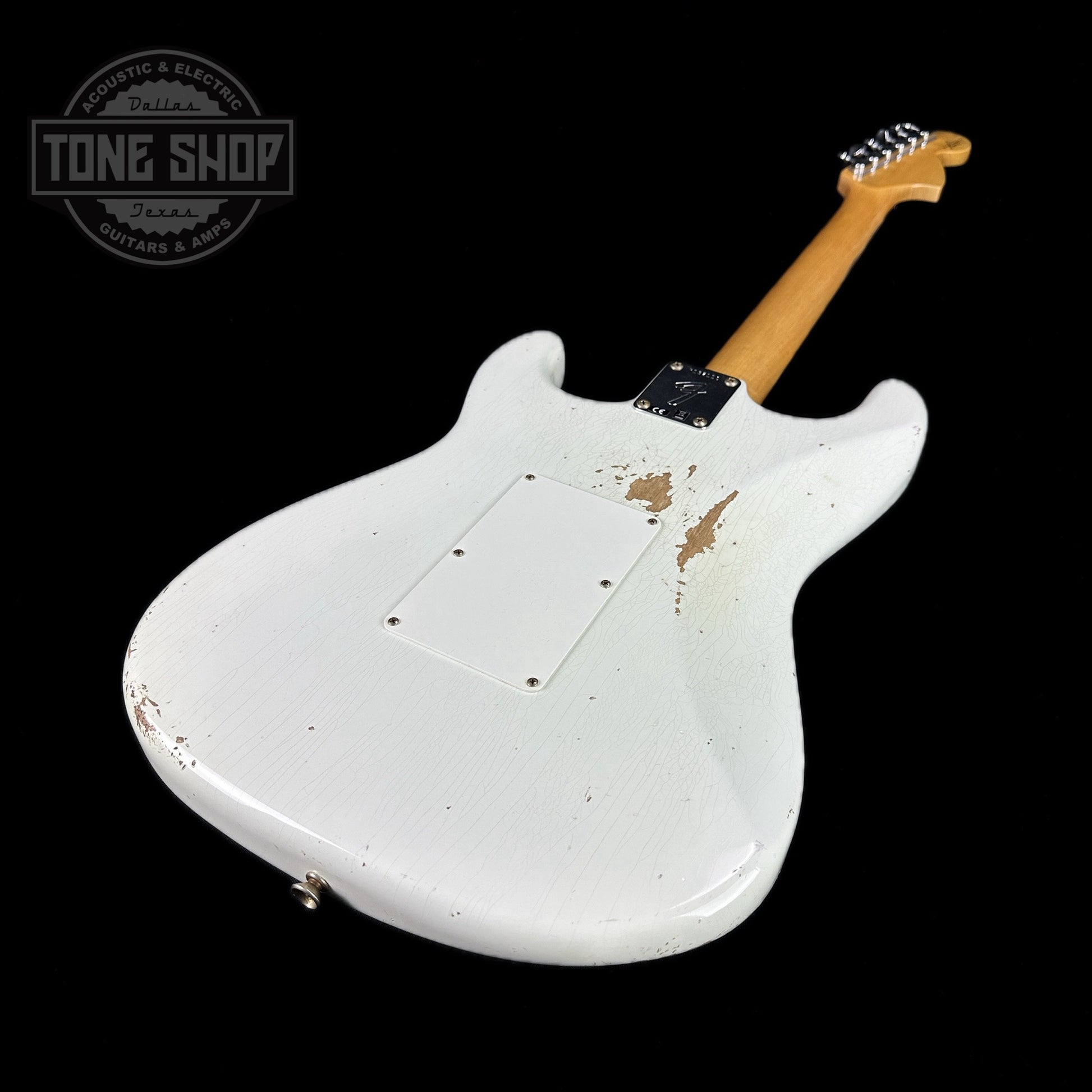 Back angle of Fender Custom Shop 69 Stratocaster Relic HSS Oly White Reverse Headstock.