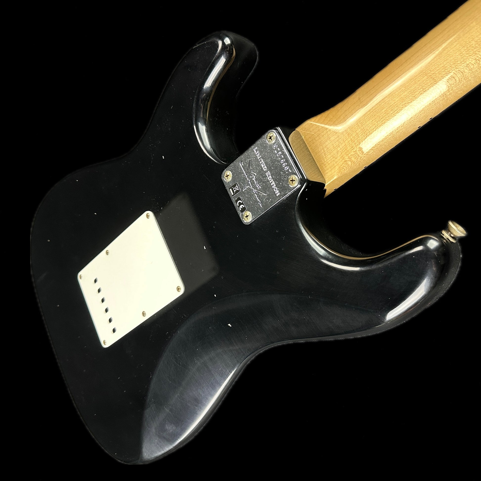 Back angle of Fender Custom Shop Limited Edition '69 Strat Journeyman Relic Aged Black.