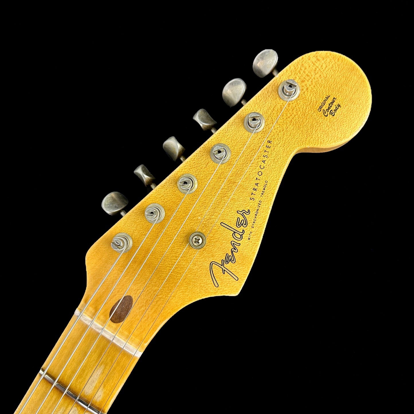 Front of headstock of Fender Custom Shop LTD 70th Anniversary 1954 Stratocaster Relic 2-Color Sunburst.