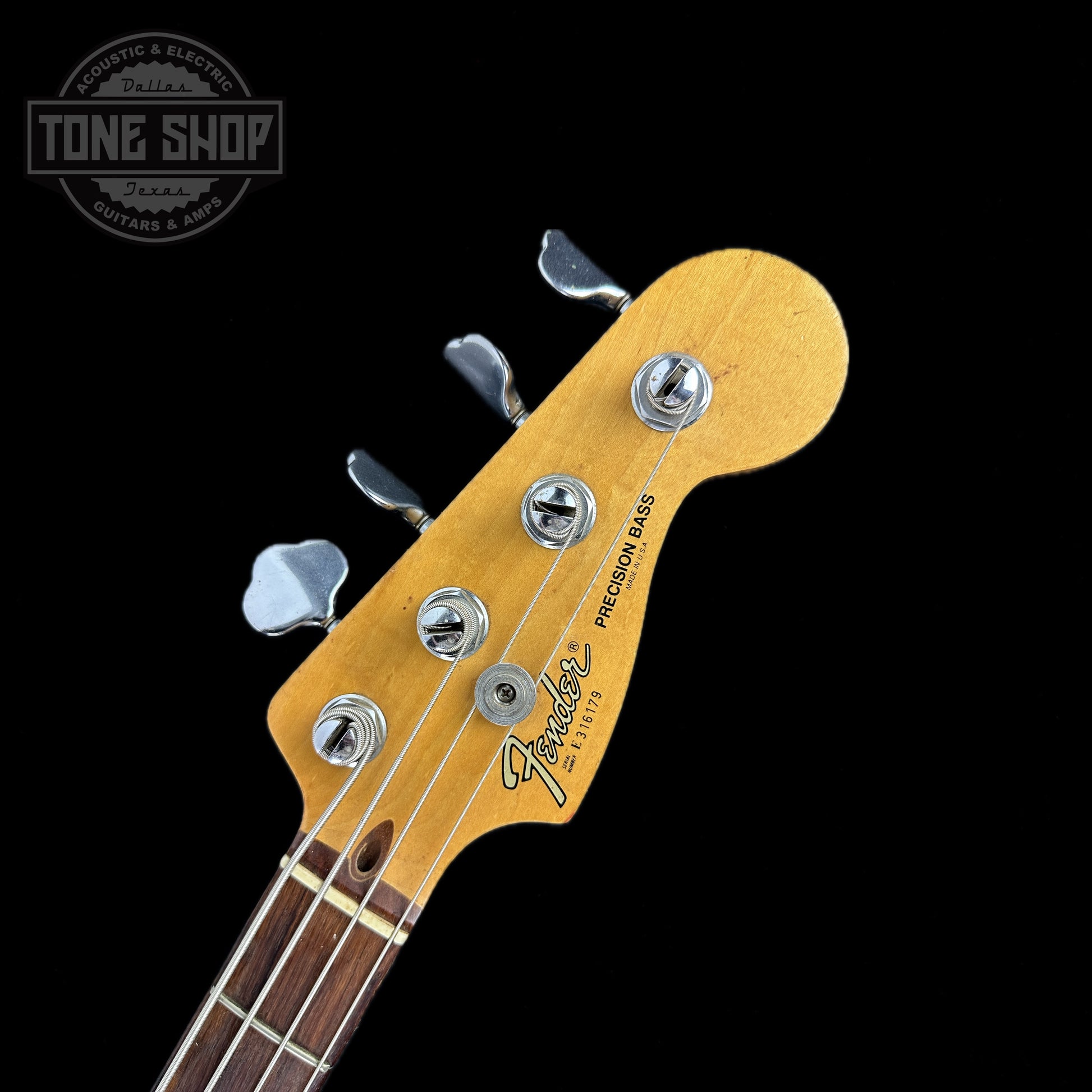 Front of headstock of Used 1983 Fender Elite Precision Bass II Sienna Burst.
