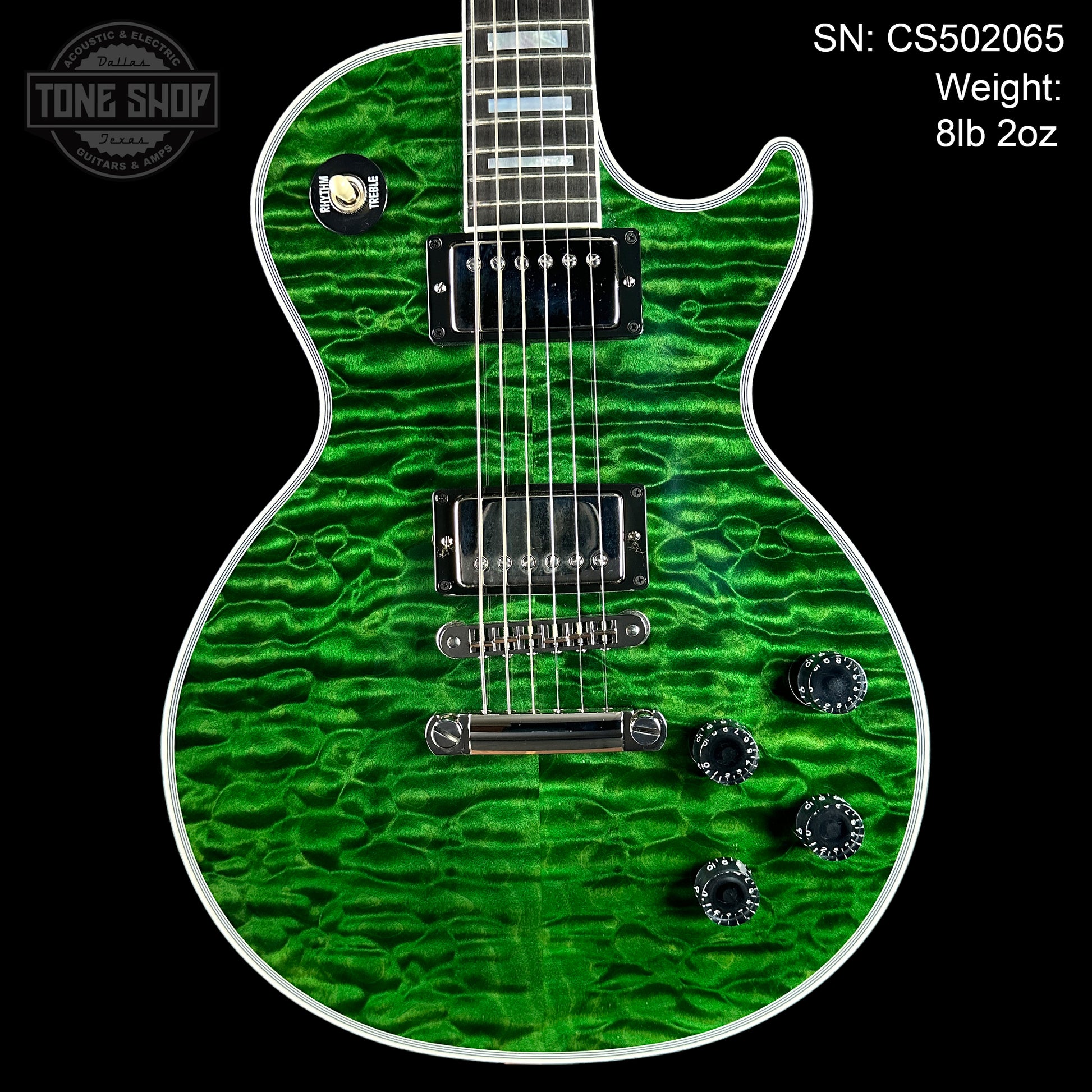 Front of Gibson Custom Shop TSG Anniversary Les Paul Custom Chambered 7A Quilt Trans Green.