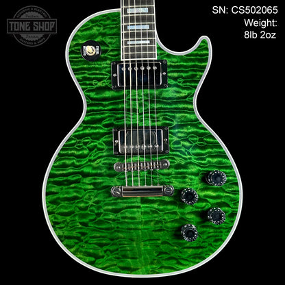 Front of Gibson Custom Shop TSG Anniversary Les Paul Custom Chambered 7A Quilt Trans Green.