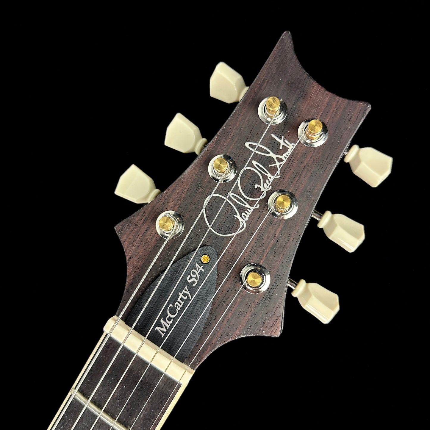 Front of headstock of PRS Paul Reed Smith McCarty 594 Cobalt Blue 10 Top.