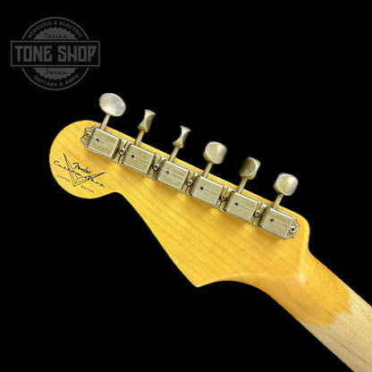Back of headstock of Fender Custom Shop Limited Edition Late 64 Strat Relic Target 3 Color Sunburst.
