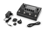 Front angle of IK Multimedia TONEX BOARD Amp Modeler and Multi-Effects Processor with cables.