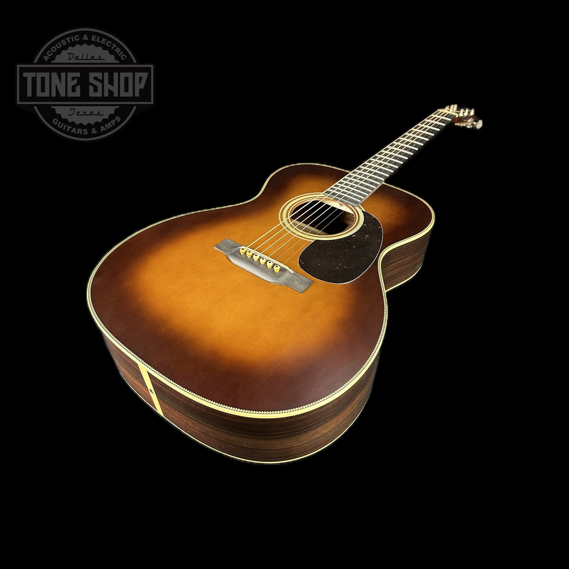 Front angle of Martin Custom Shop 000-28 Authentic 1937 Vintage Low Gloss w/Stage 1 Aging w/Ambertone Burst.