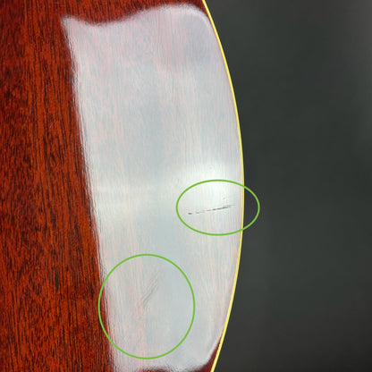 Scratches on back of Used Takamine Santa Fe ESF40C.