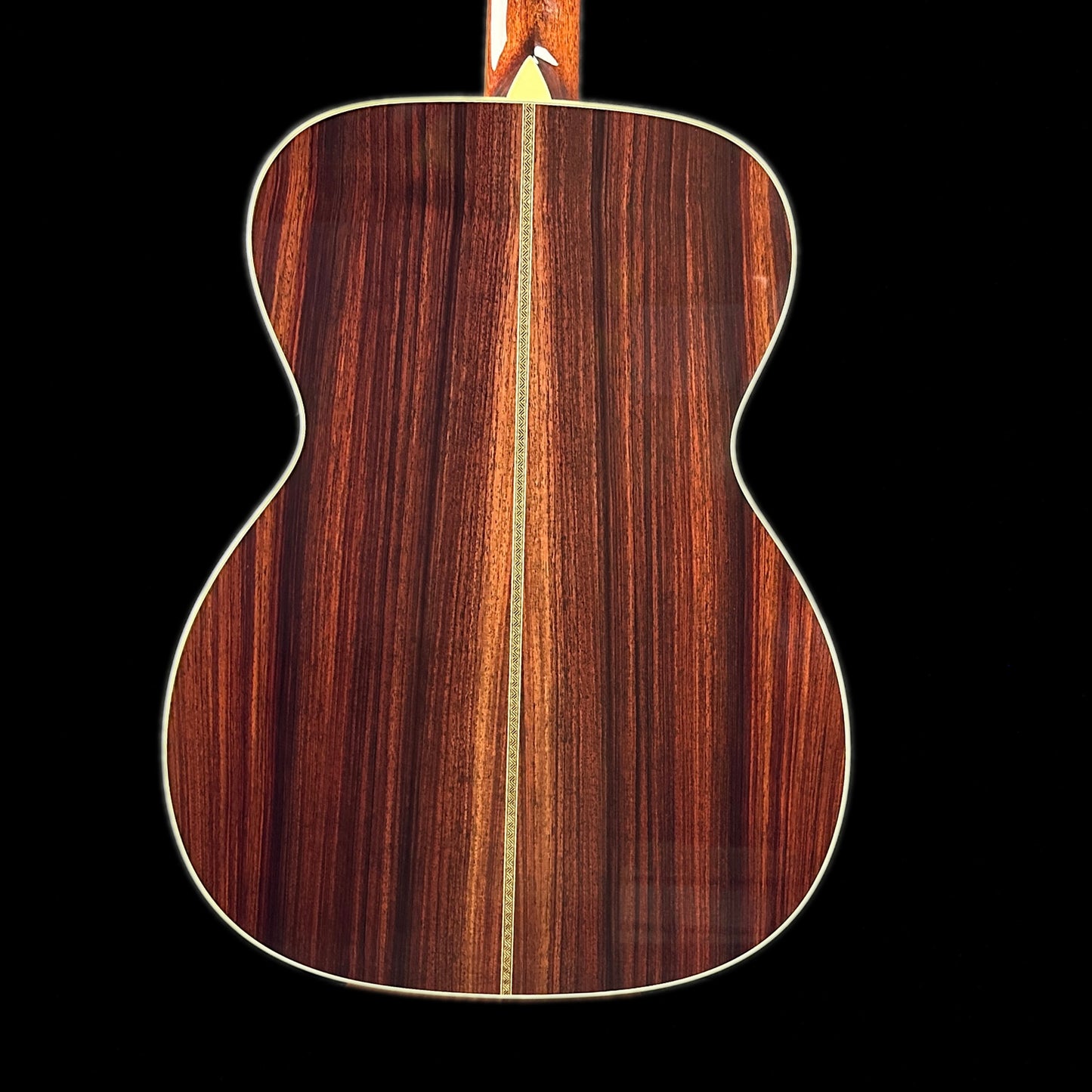 Back of body of Collings OM2H Natural.