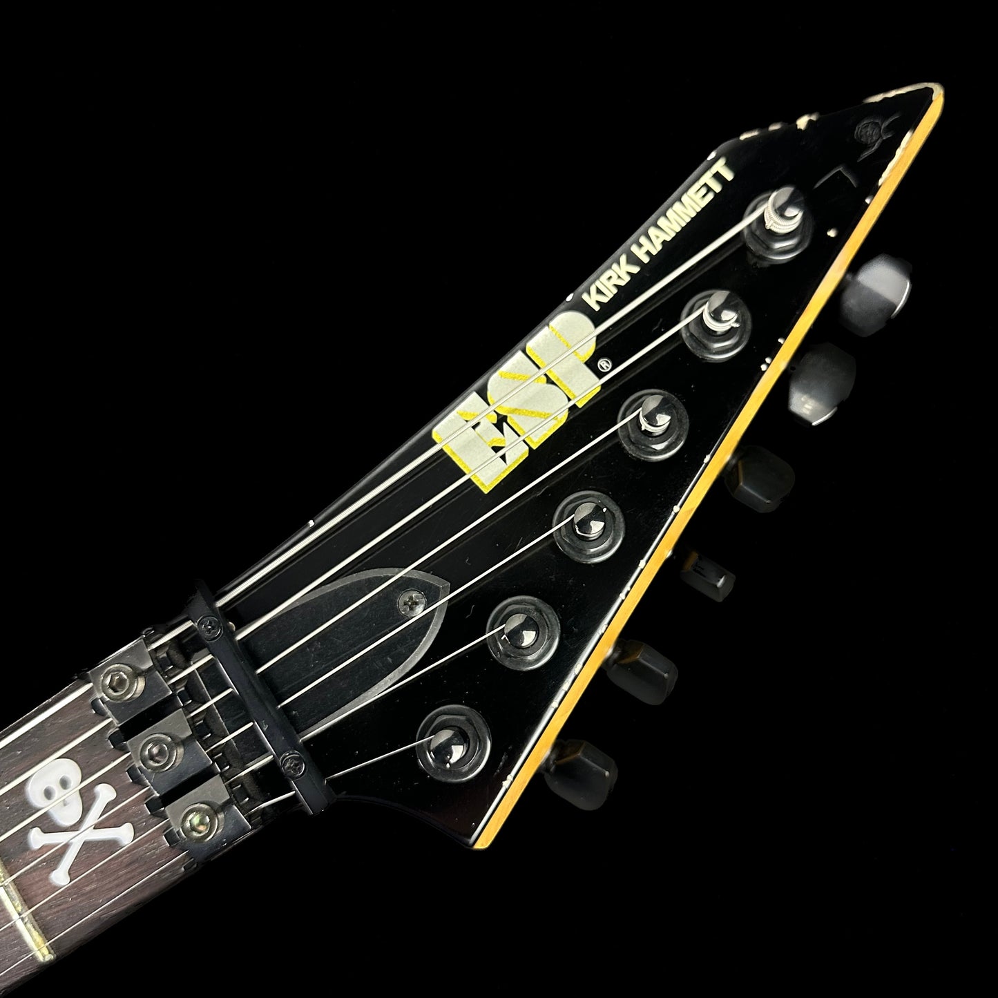 Close up of ESP KH-2 Vintage Kirk Hammett Signature Series Distressed Black headstock.