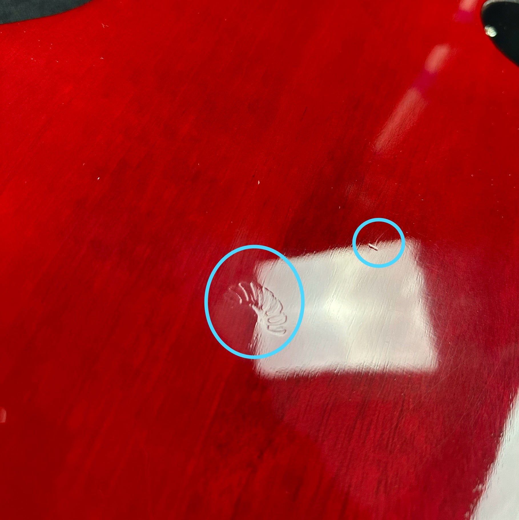 Damage on back of body of Used Gibson Les Paul Classic Cherry Burst.