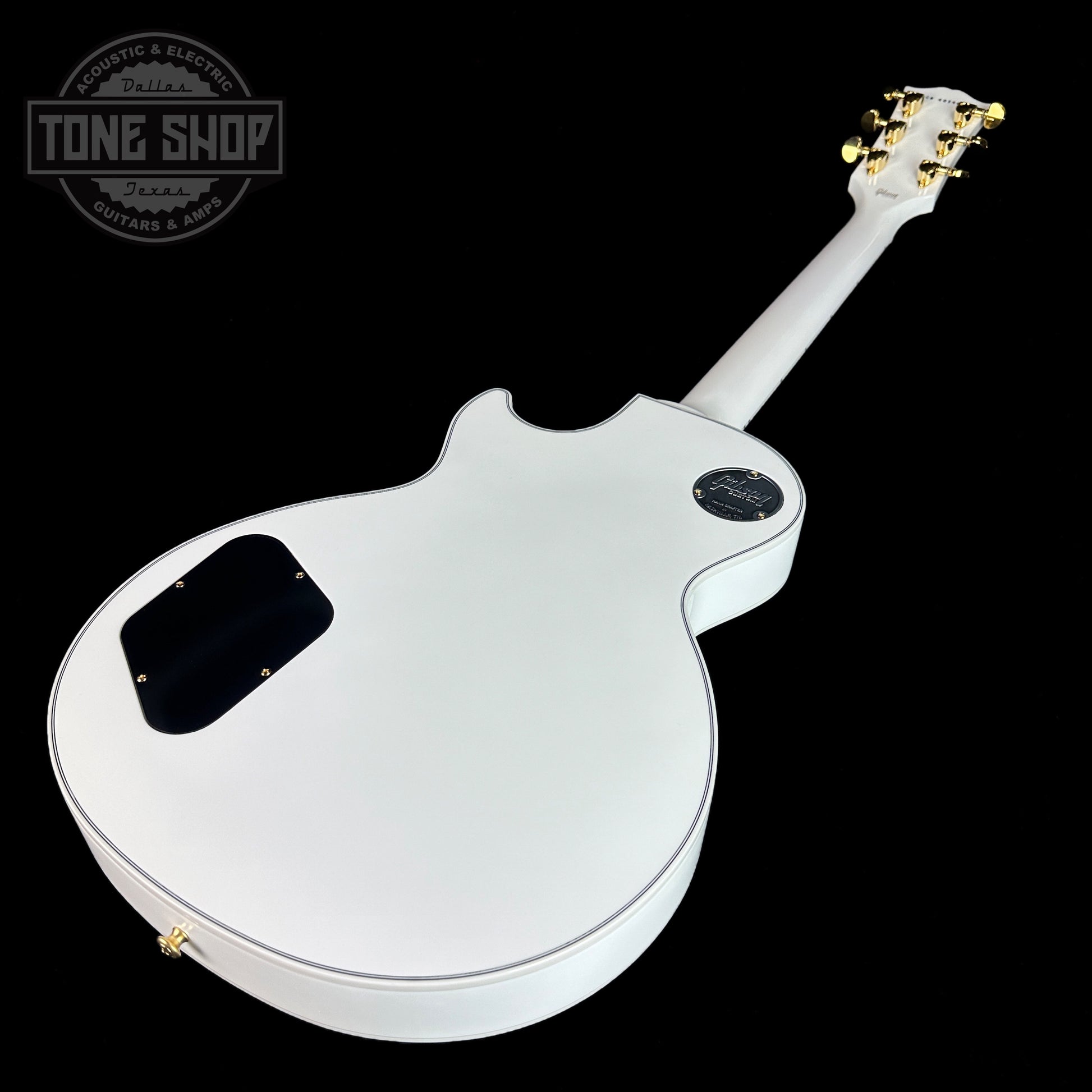 Back angle of Gibson Custom Shop Les Paul Custom Alpine White w/ Ebony Fingerboard Gloss.