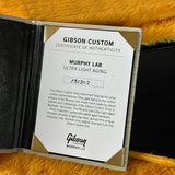 Gibson Custom Certificate of Authenticity for Murphy Lab Ultra Light Aging on a textured surface