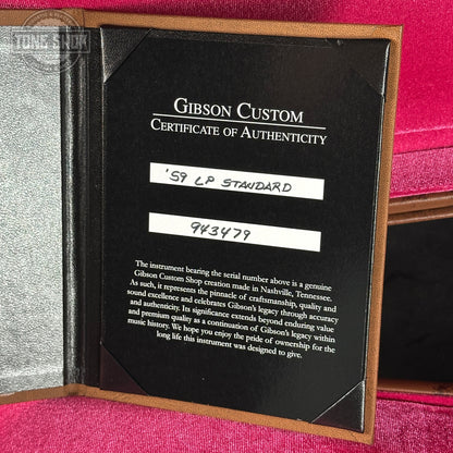 Gibson Custom Certificate of Authenticity on a pink and brown background