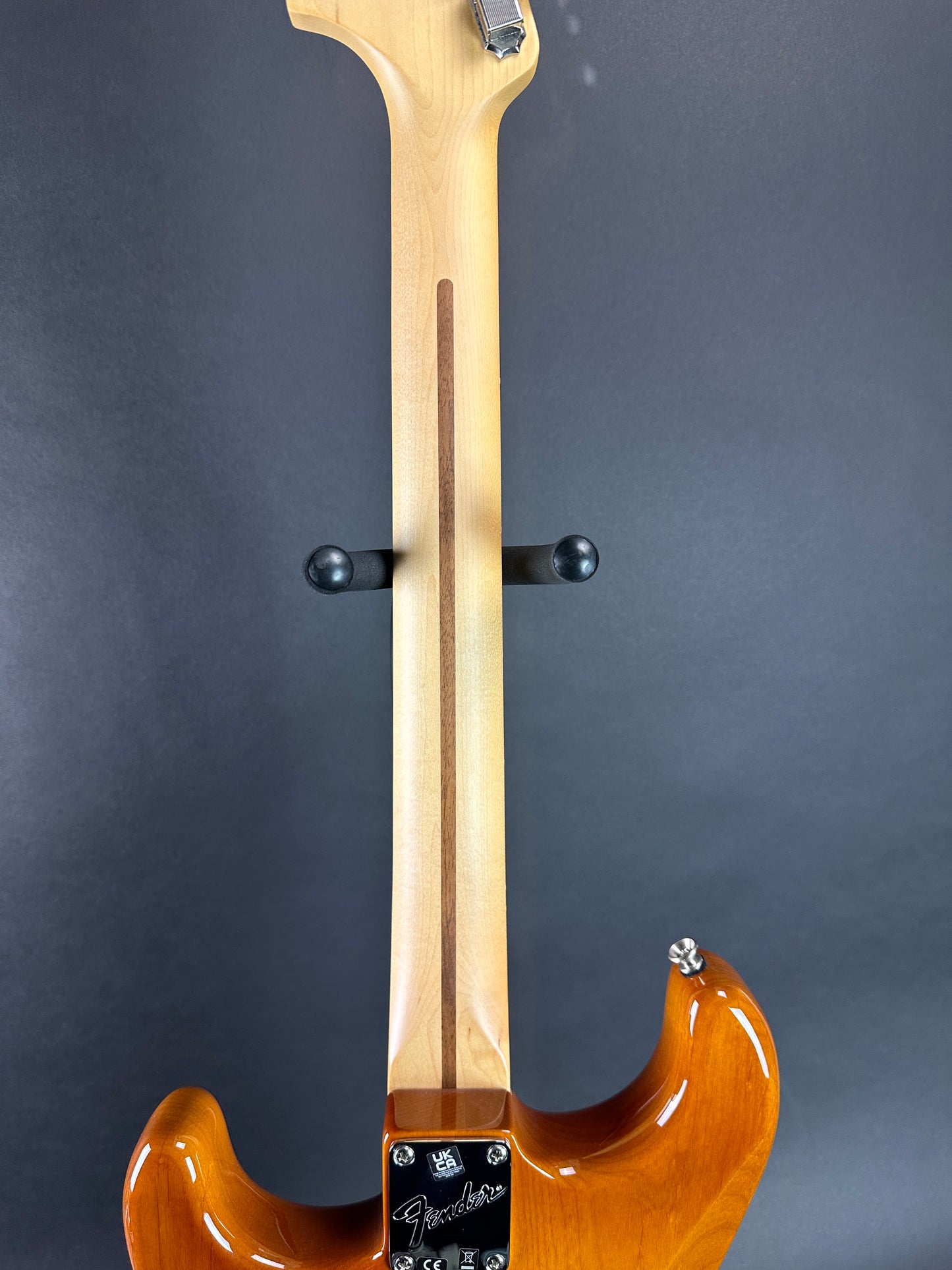 Back of neck of Used Fender American Performer Stratocaster RW Honey Burst.