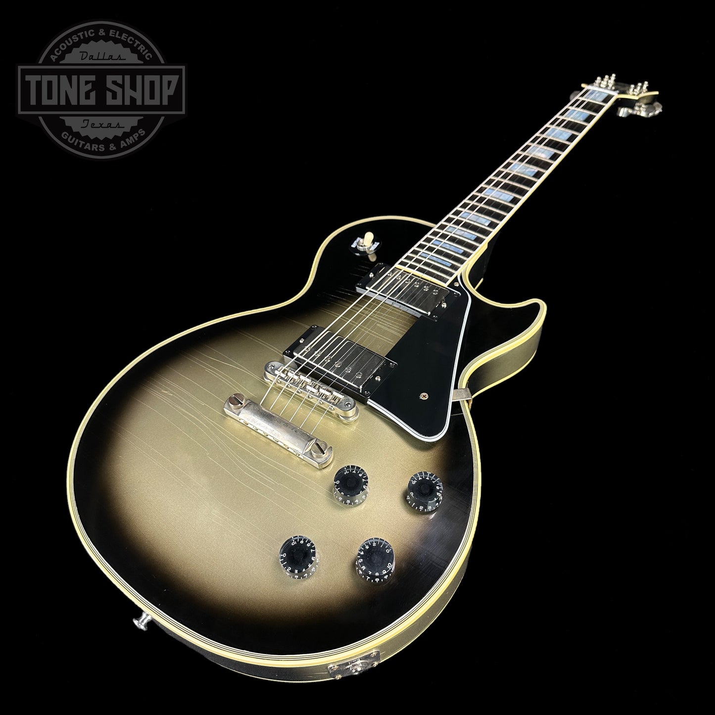 Front angle of Gibson Custom Shop Murphy Lab M2M Les Paul Custom Chambered Antique Silverburst Ultra Light Aged NH.