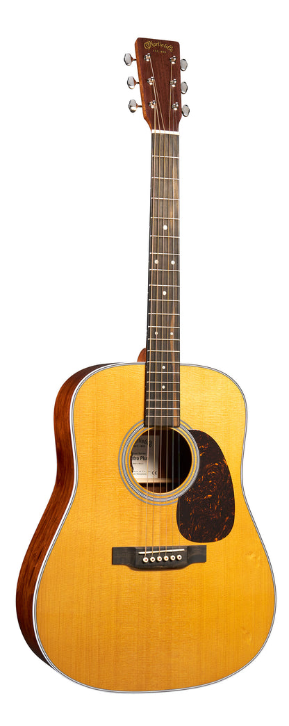 Acoustic guitar with a wooden body and neck on a white background