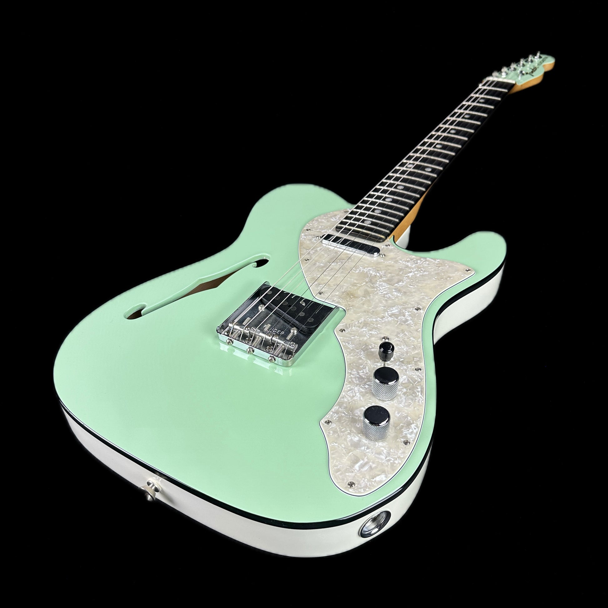 Front angle of Used Fender Limited Two Tone Telecaster Thinline Seafoam Green.