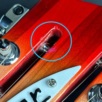 Damage on front of headstock of Used Rickenbacker 370/12 Fireglo.