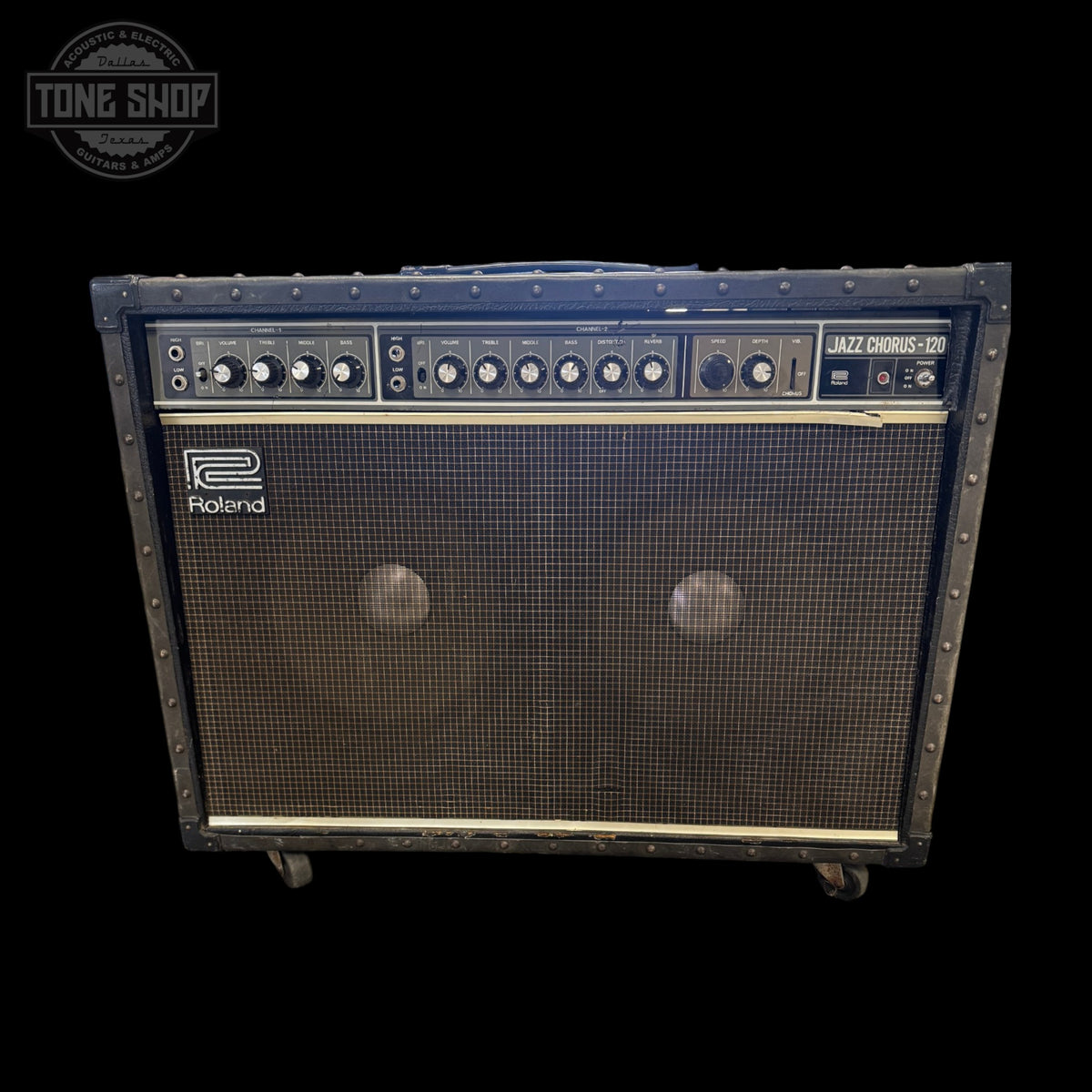 Roland guitar amplifier on a white background with 'Tone Shop' logo.