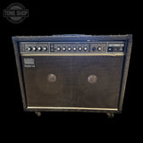 Roland guitar amplifier on a white background with 'Tone Shop' logo.