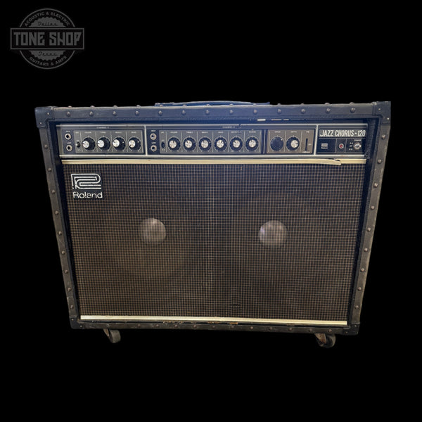 Roland guitar amplifier on a white background with 'Tone Shop' logo.