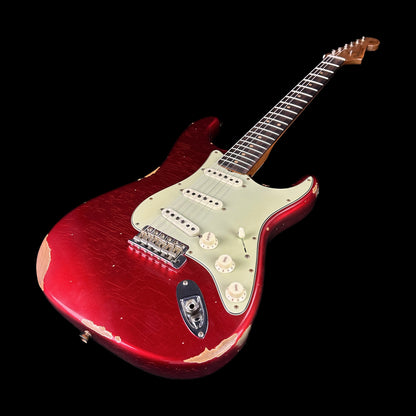 Front angle of Fender Custom Shop Limited Edition '63 Strat Relic Aged Candy Apple Red.