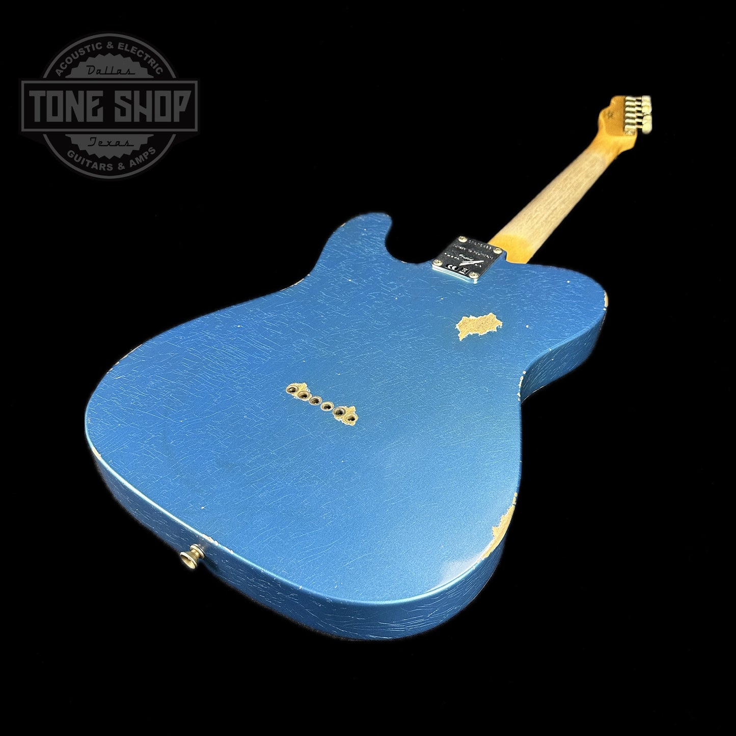 Back angle of Fender Custom Shop Limited Edition '64 Tele Relic Aged Lake Placid Blue.
