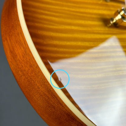 Small ding on bottom edge of Used Epiphone Les Paul Flame Top Standard Sunburst.