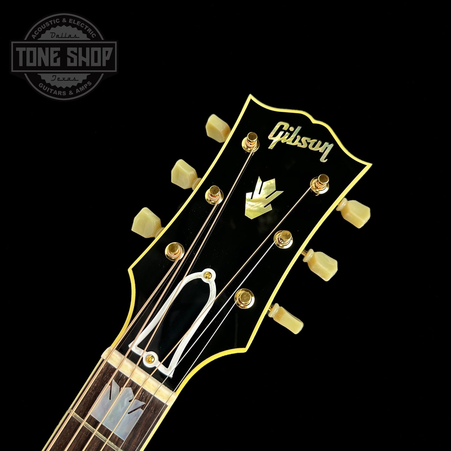 Front of headstock of Gibson Custom Shop M2M SJ-200 Original Cherry.