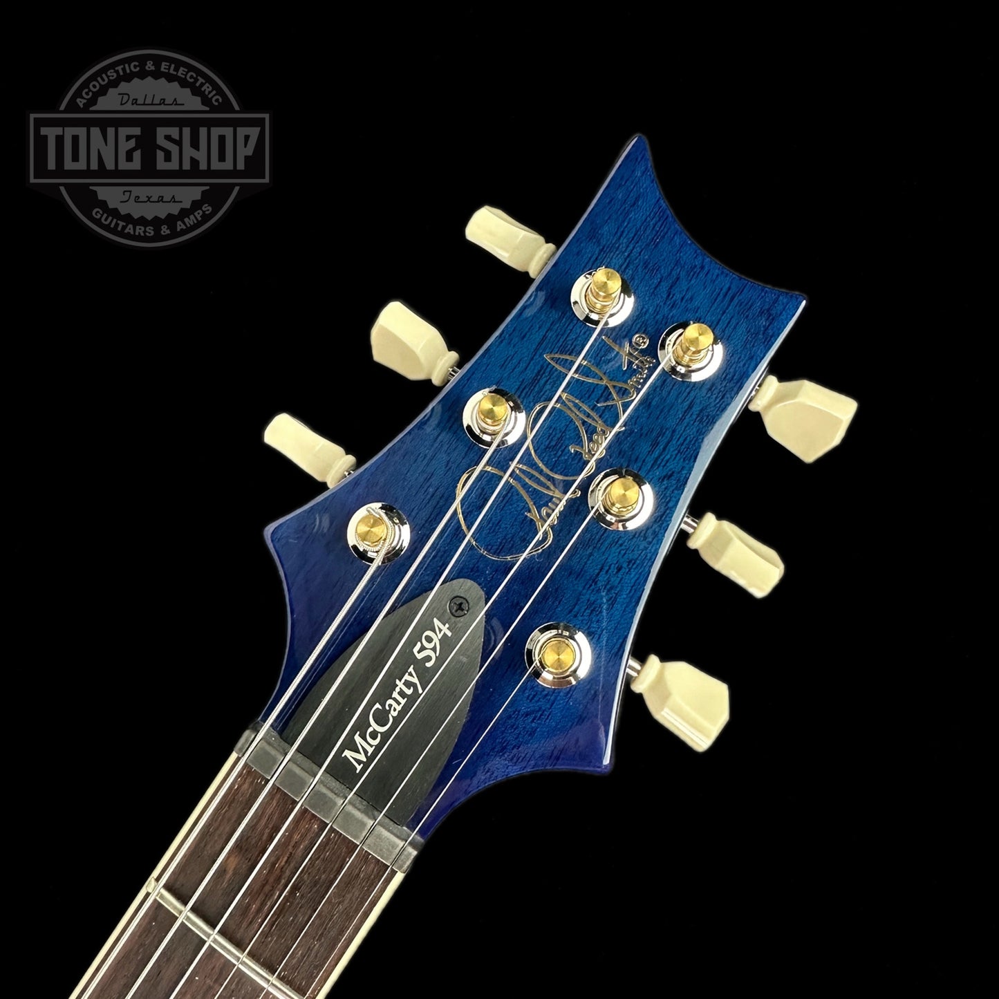 Front of headstock of PRS Paul Reed Smith S2 McCarty 594 Singlecut Quilt Faded Gray Black Blue Burst.