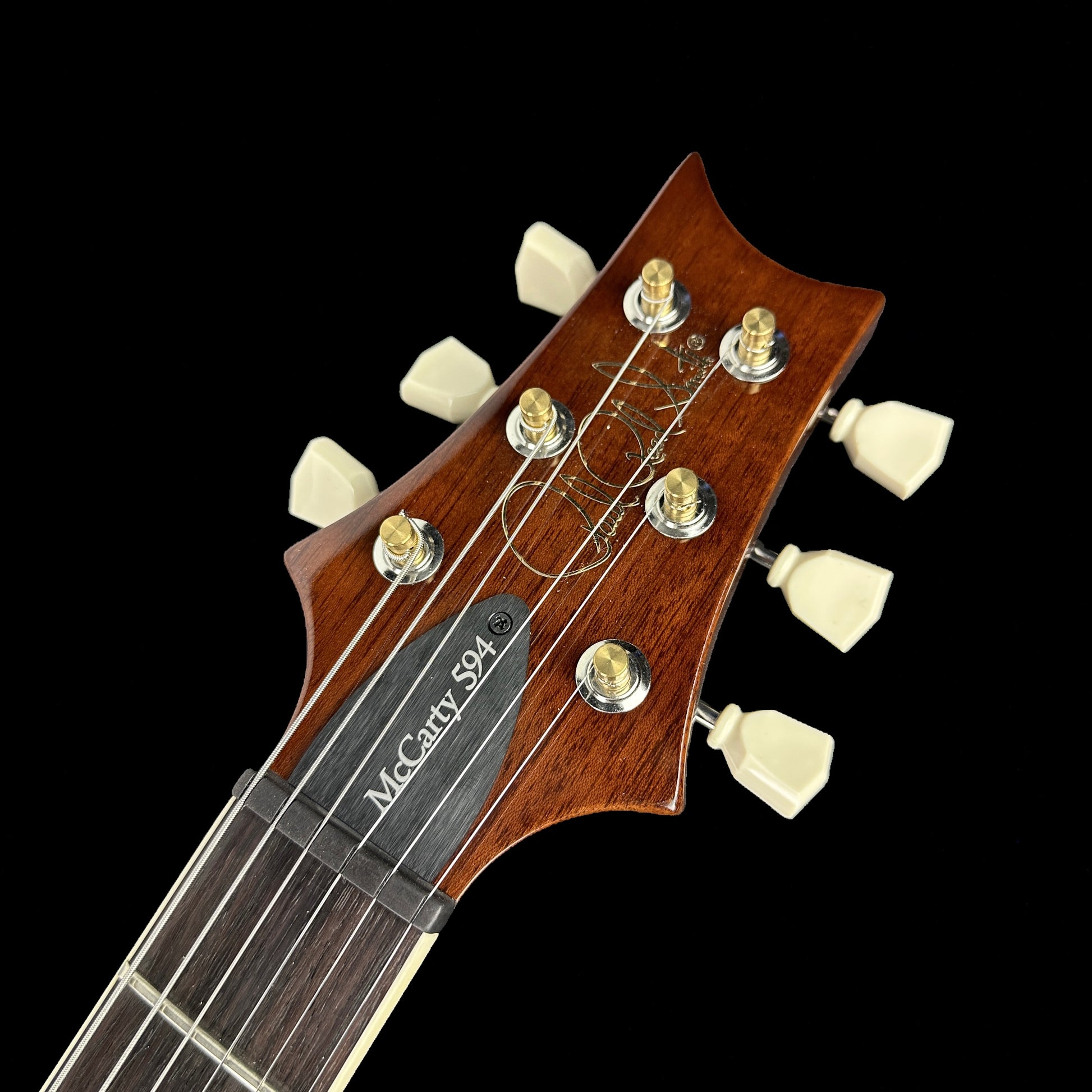 Front of headstock of PRS Paul Reed Smith S2 McCarty 594 Singlecut Quilt Livingston Lemondrop.