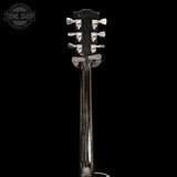 Back of headstock of Used 2024 Gibson Les Paul Trad Pro V Dark Purple Burst.