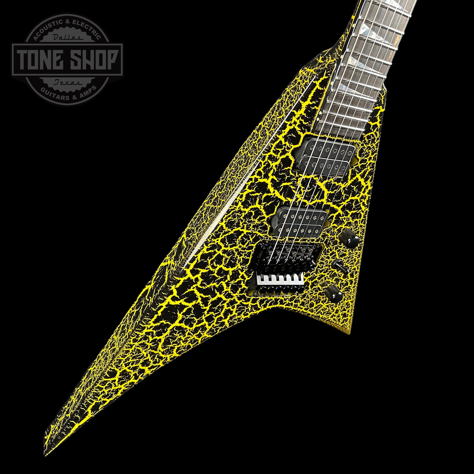 Front angle of Jackson Custom Shop Limited Edition Randy Rhoads Nos Black With Yellow Crackle.