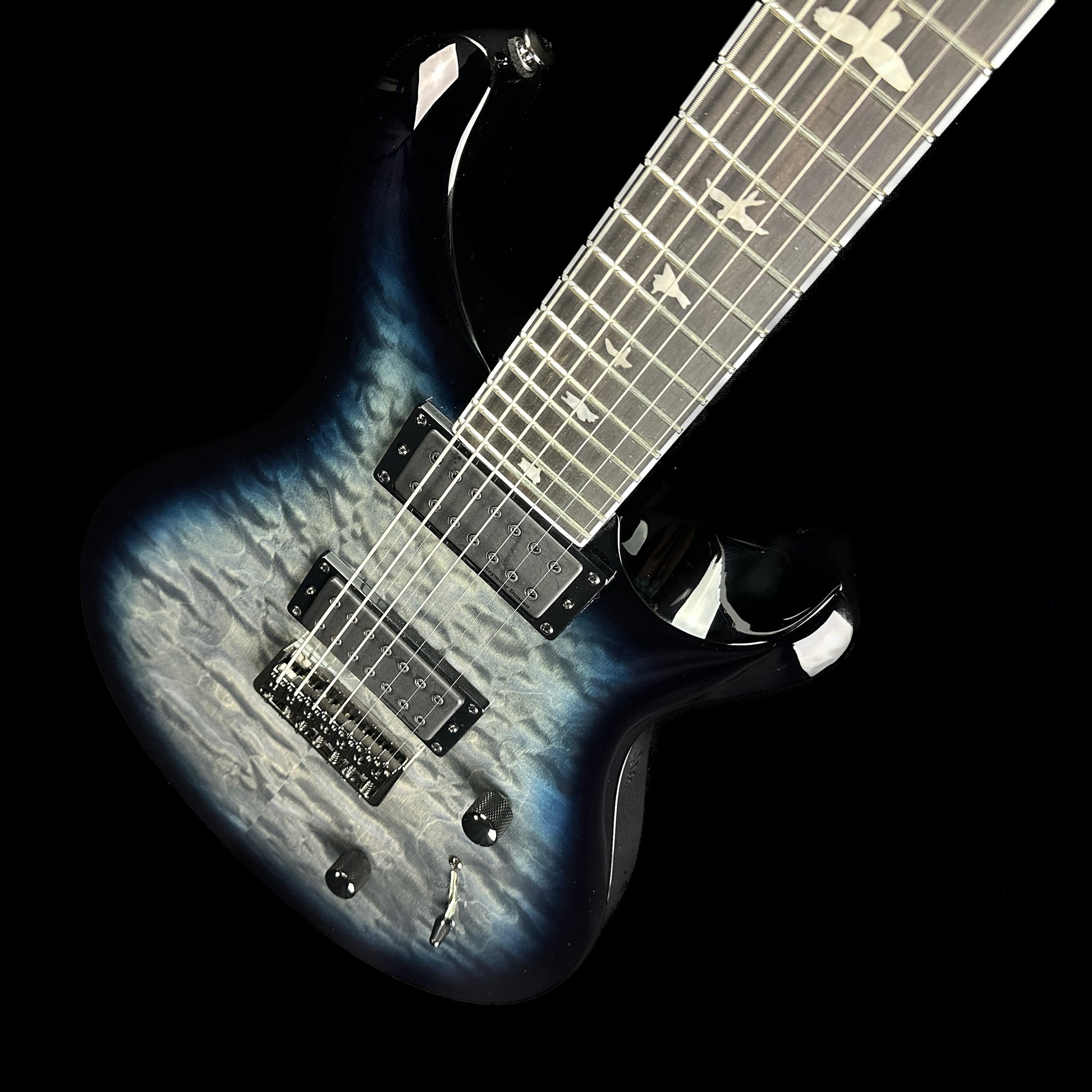 Front angle of PRS Paul Reed Smith SE Mark Holcomb SVN 7 String Holcomb Blue Burst.