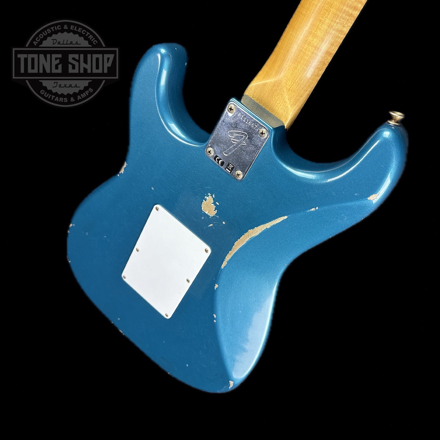 Back angle of Fender Custom Shop 69 Stratocaster Relic HSS Ocean Turquoise Reverse Headstock.