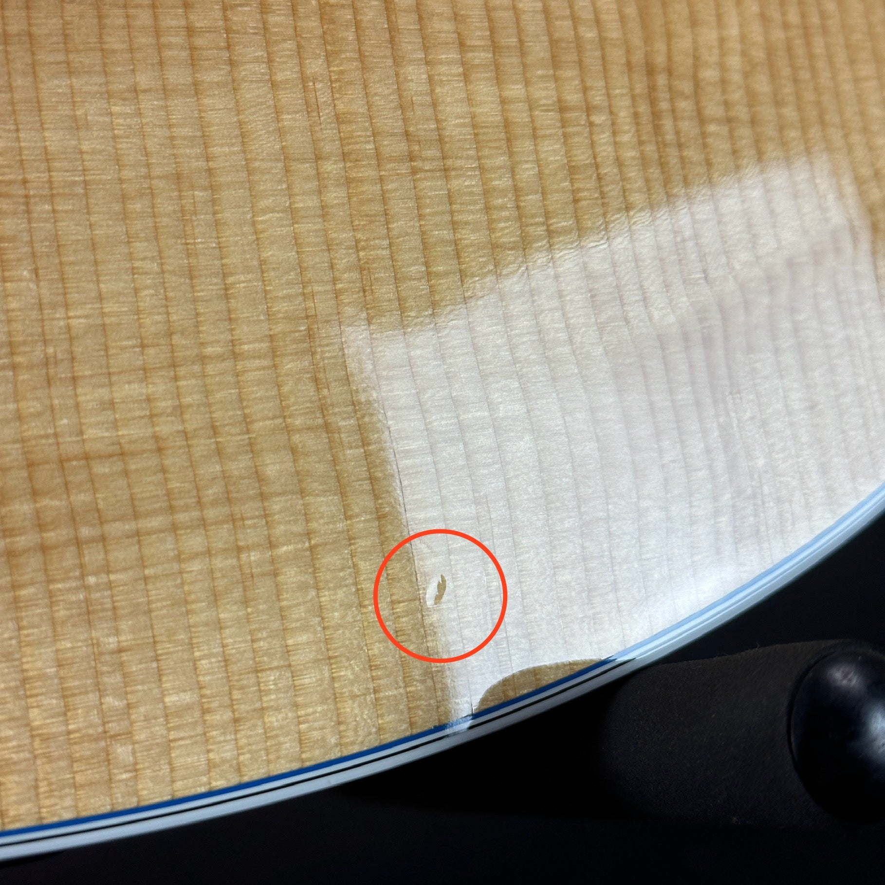 Small ding on body of Used Martin SC-13e.