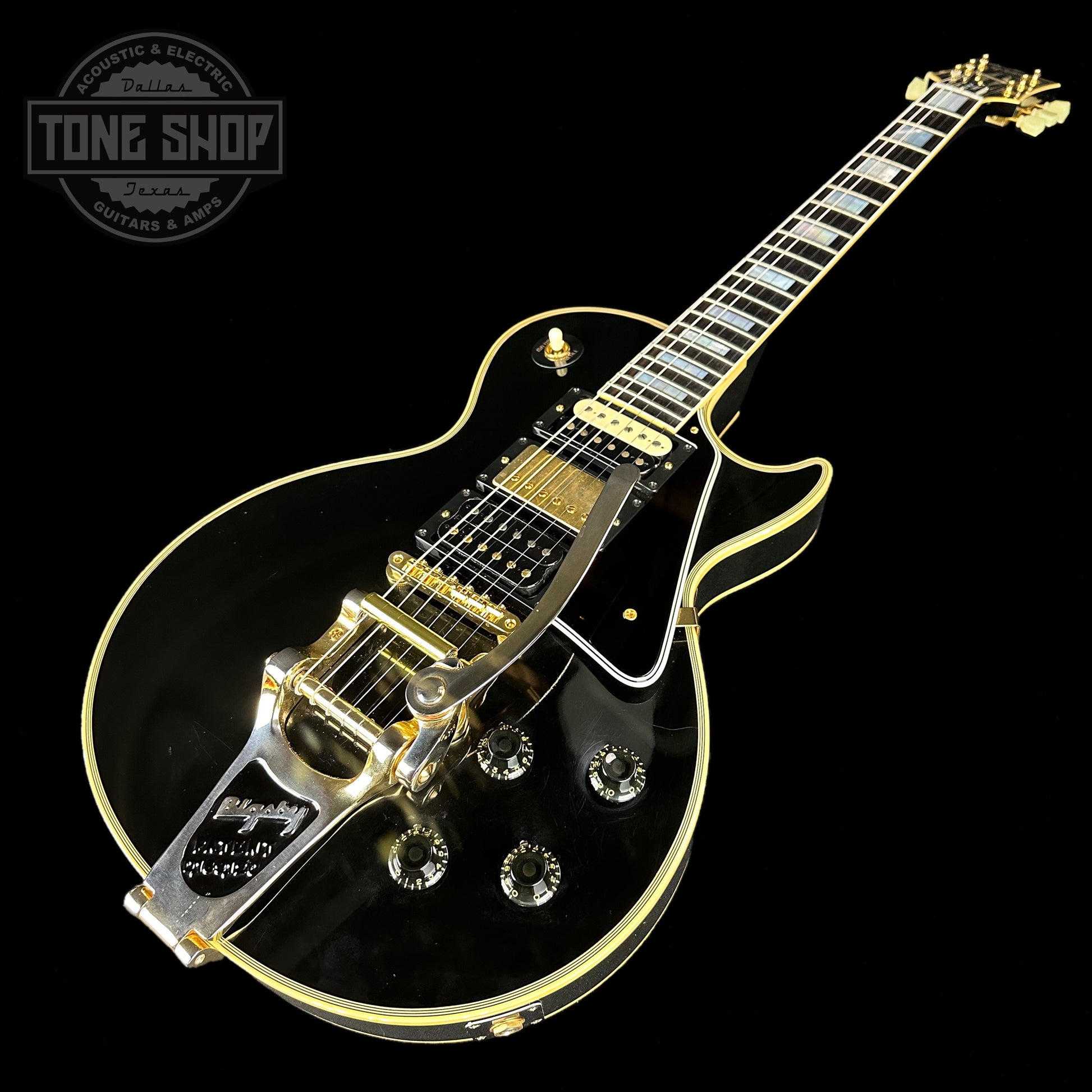 Front angle of Used Gibson Custom Shop 57 Les Paul Custom 3 Pickup Bigsby.