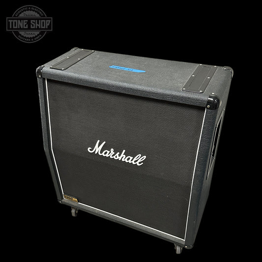Marshall guitar amplifier cabinet on a black background with 'Tone Shop' logo.