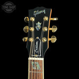 Headstock of Gibson Hummingbird Elegant Koa Honey Burst.