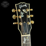 Headstock of Gibson Hummingbird Custom Koa Antique Natural.