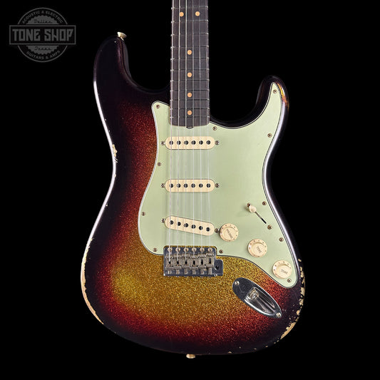 Electric guitar with a sunburst finish on a black background, featuring the Tone Shop logo.