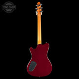 Red electric guitar with a wooden neck on a black background, featuring 'Tone Shop' logo.