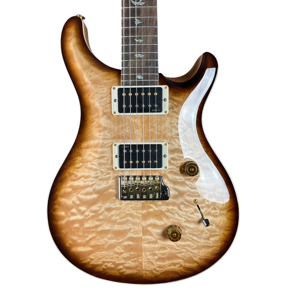 Electric guitar with a sunburst finish on a white background