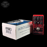 Catalinbread Belle Epoch tape echo effects pedal next to its packaging on a black background.