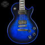 Blue electric guitar with a black background