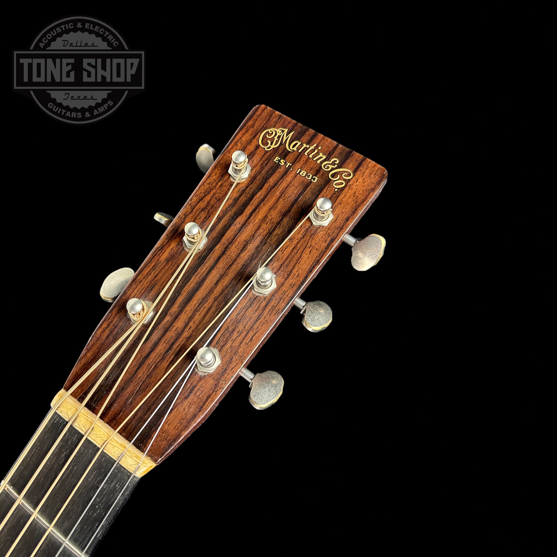 Front of headstock of Martin Custom Shop D-28 Authentic 1937 Vintage Low Gloss w/Ambertone Burst w/Stage 1 Aging.