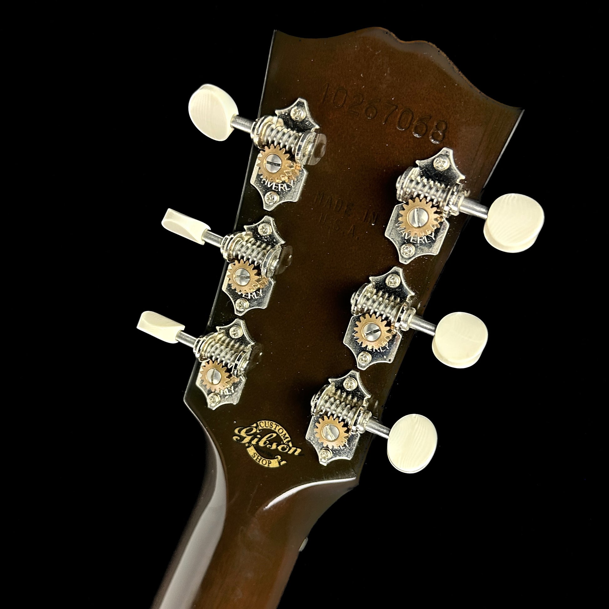 Back of headstock of Used Gibson J-45 12 Fret Edition Burst.