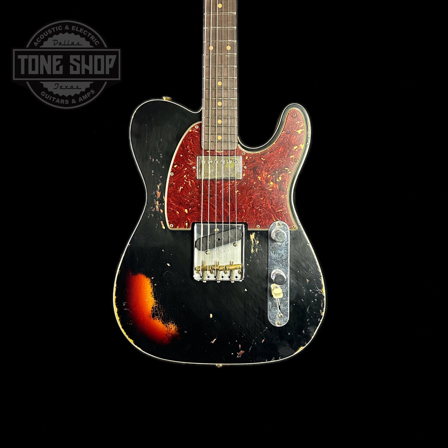 Front of body of Fender Custom Shop Limited Edition Reverse '60 Tele Custom Heavy Relic Aged Black Over 3 Color Sunburst.